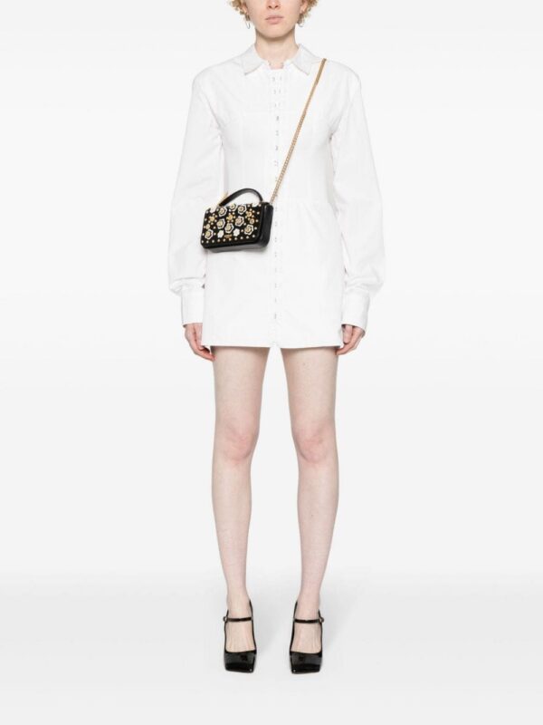 23286961_53453943_1000.jpg Moschino floral-appliqué mini bag