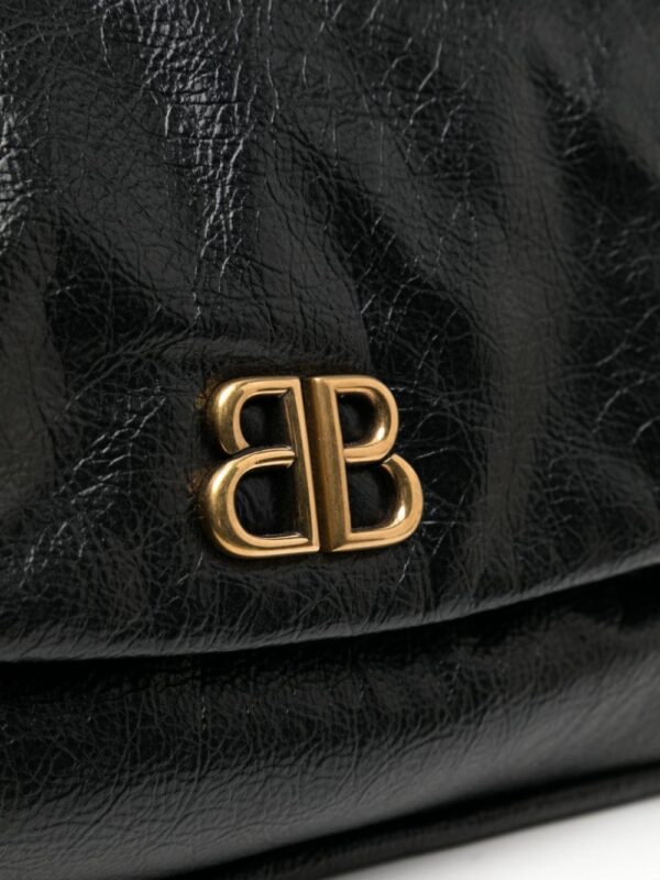 23309648_53768053_1000.jpg Balenciaga Monaco leather clutch bag