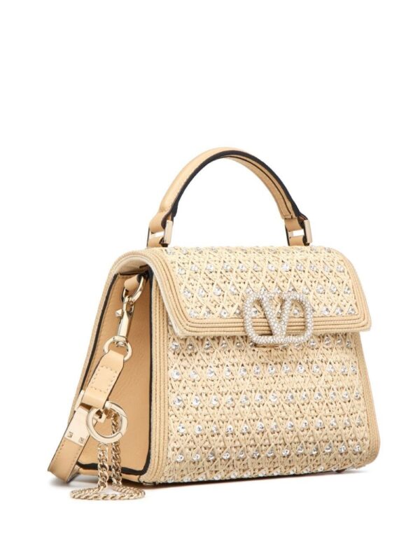 23443754_53570085_1000.jpg Valentino Garavani VSLING interwoven shoulder bag