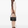 23622620_53604652_1000.jpg Love Moschino logo-plaque leather shoulder bag