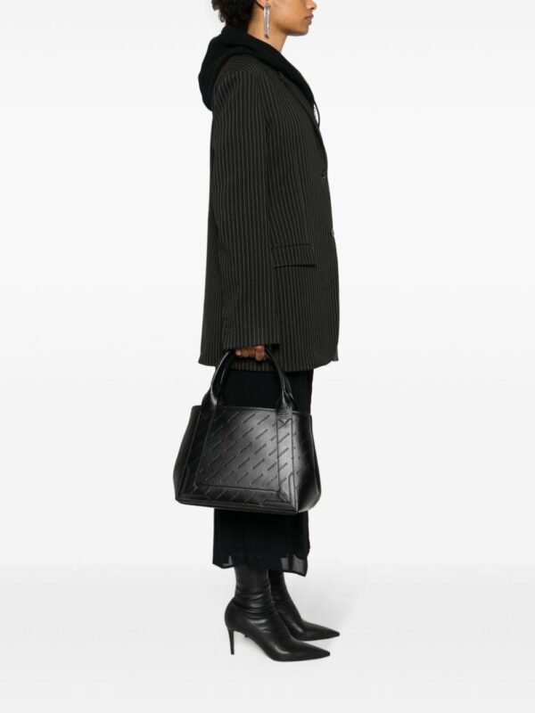 23641438_53594566_1000.jpg Balenciaga debossed-logo tote bag