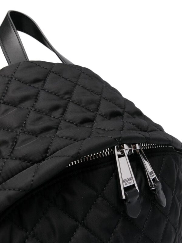 23712680_54059179_1000.jpg Moschino logo lettering quilted backpack