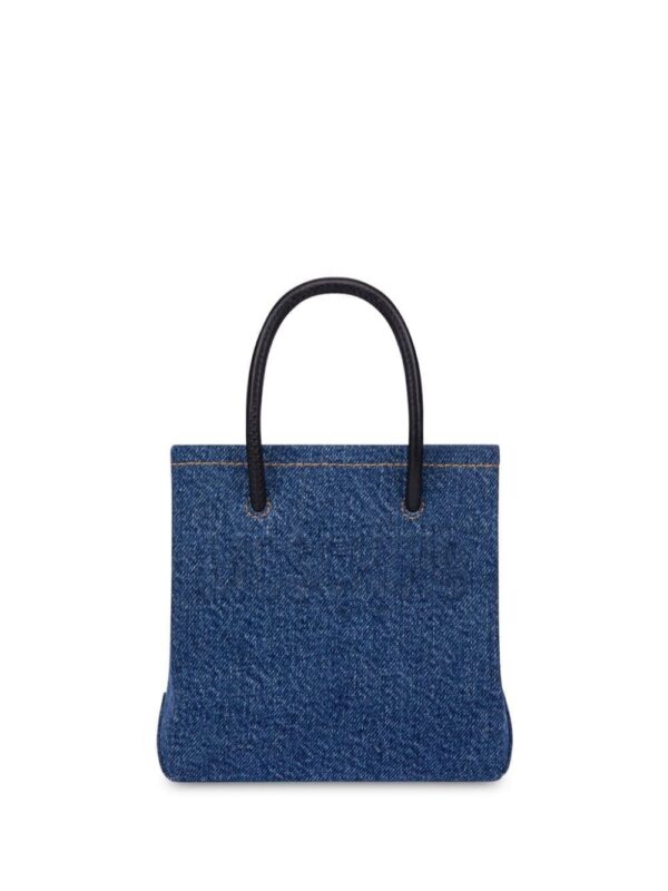 23720440_53593431_1000.jpg Moschino logo-embossed denim mini bag