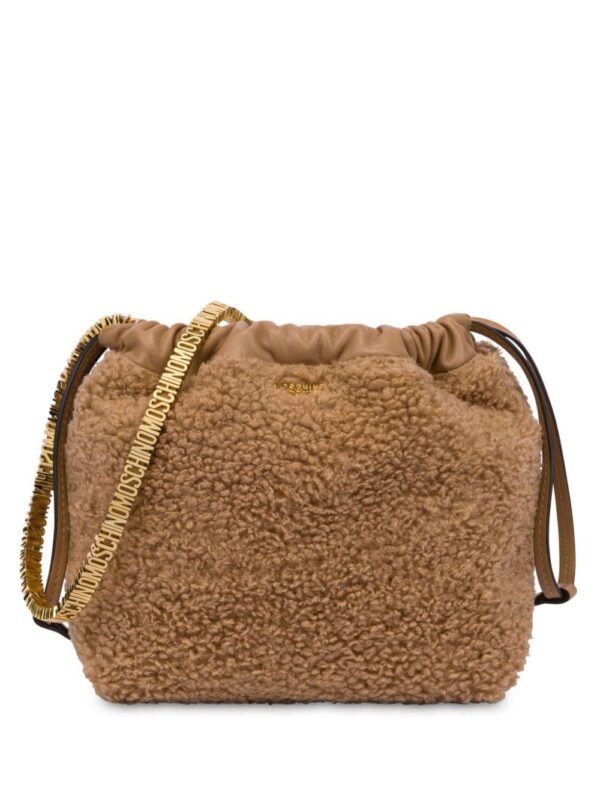23720453_53593521_1000.jpg Moschino logo-lettering faux-shearling shoulder bag