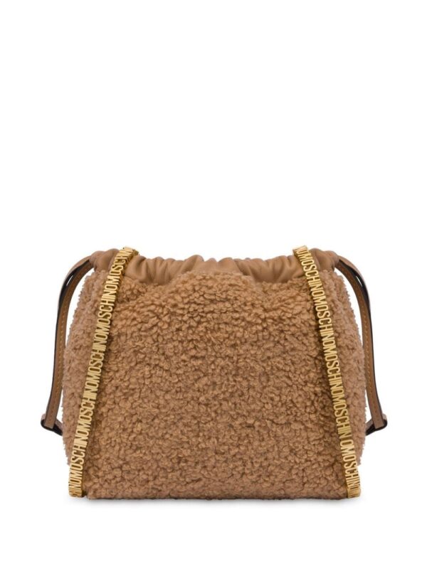 23720453_53593522_1000.jpg Moschino logo-lettering faux-shearling shoulder bag