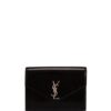 23760254_53659729_1000.jpg Saint Laurent Cassandre patent-leather clutch bag