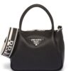23802422_53734002_1000.jpg Prada logo-lettering top-handle bag