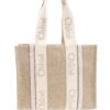 23844258_53812866_1000.jpg Chloé medium Woody logo-strap linen tote bag