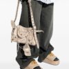 23857943_53868015_1000.jpg Balenciaga gold Cagole mini shoulder bag