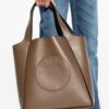 23860039_53834141_1000.jpg Stella McCartney logo-perforated faux-leather tote bag