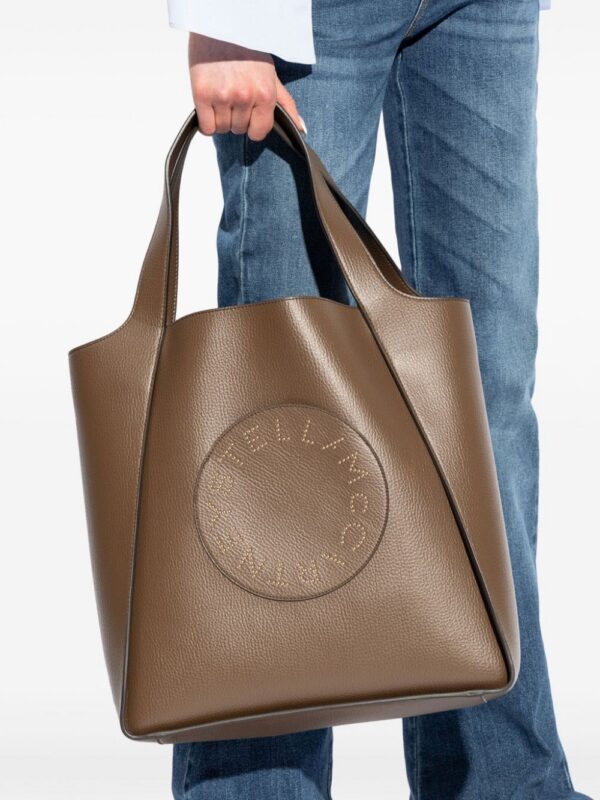 23860039_53834141_1000.jpg Stella McCartney logo-perforated faux-leather tote bag