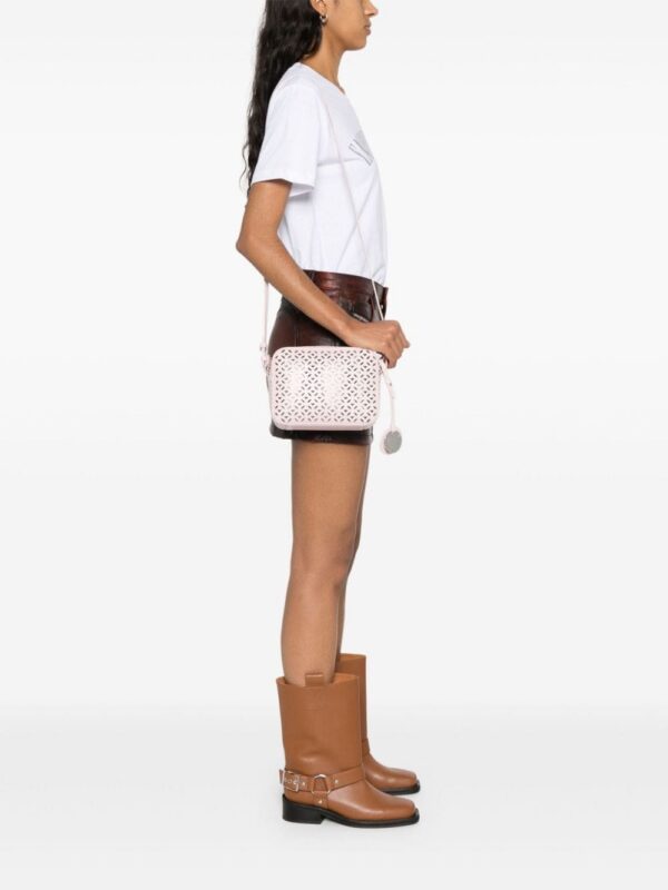 23884013_54061067_1000.jpg Emporio Armani perforated-design cross body bag