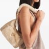 23897388_53955872_1000.jpg Prada shearling-panelling shoulder bag
