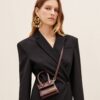 23E213BA001-3100-852_10-scaled-1.jpg Jacquemus Le Chiquito Signature leather mini handbag.