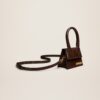 23E213BA001-3100-852_11.jpg Jacquemus Le Chiquito Signature leather mini handbag.