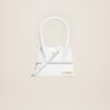 23E213BA002-3000-100_1_main.jpg Jacquemus Le Chiquito moyen Leather handbag.