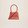 23E213BA002-3088-480_1_main.jpg Jacquemus Le Chiquito moyen Leather handbag.