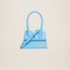 23E213BA002-3101-336_1_main.jpg Jacquemus Le Chiquito moyen Leather handbag.