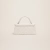 Jacquemus Le Chiquito long  Long signature handbag.