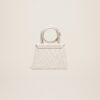 23E213BA005-3071-140_12.jpg Jacquemus Le Chiquito Noeud Coiled handbag.