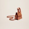 23E213BA005-3072-810_11.jpg Jacquemus Le Chiquito Noeud Coiled handbag.