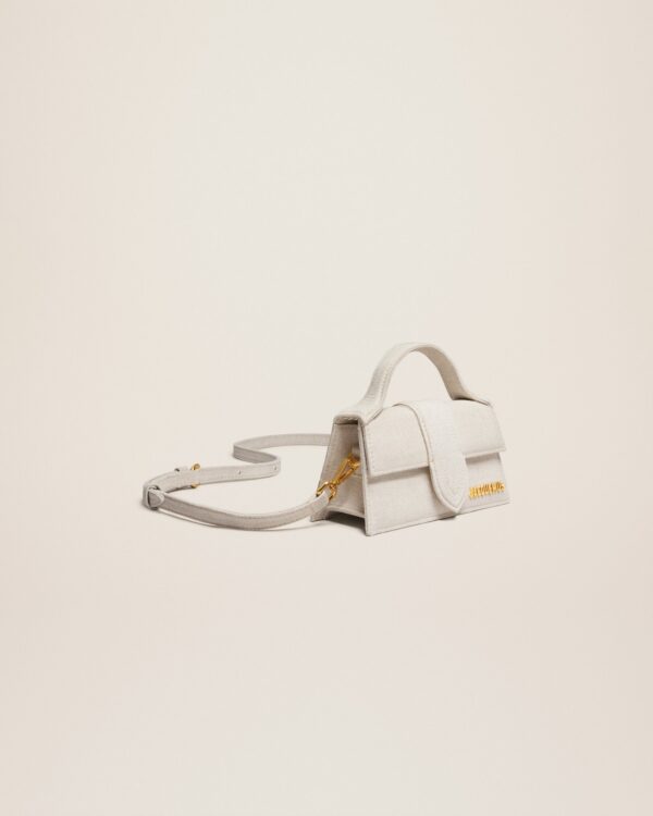 23E213BA006-3071-140_11.jpg Jacquemus Le Bambino Mini flap bag.