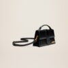 Jacquemus Le grand Bambino  Handbag with adjustable crossbody strap.