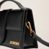 Jacquemus Le grand Bambino  Handbag with adjustable crossbody strap.