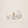 23E213BA007-3071-140_11.jpg Jacquemus Le grand Bambino Crossbody flap bag.