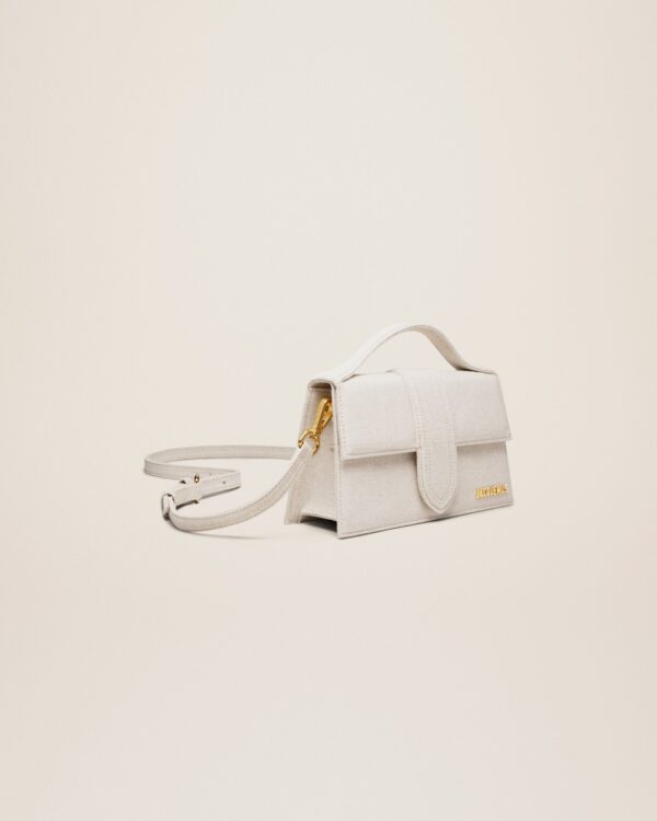 23E213BA007-3071-140_11.jpg Jacquemus Le grand Bambino Crossbody flap bag.