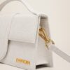 23E213BA007-3071-140_13.jpg Jacquemus Le grand Bambino Crossbody flap bag.