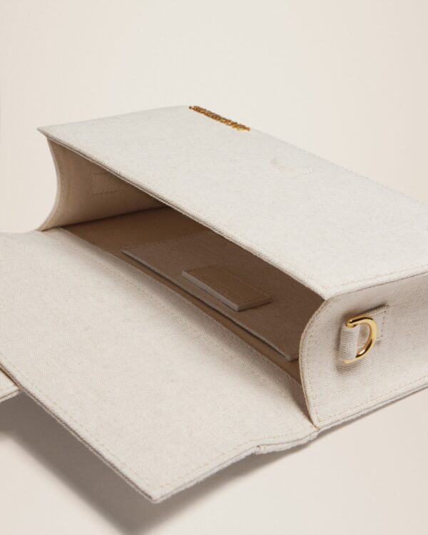 23E213BA007-3071-140_14.jpg Jacquemus Le grand Bambino Crossbody flap bag.