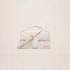 23E213BA007-3071-140_1_main.jpg Jacquemus Le grand Bambino Crossbody flap bag.