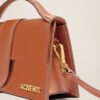 23E213BA007-3072-811_13.jpg Jacquemus Le grand Bambino Crossbody flap bag.