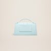 23E213BA007-3088-310_12.jpg Jacquemus Le grand Bambino Crossbody flap bag.