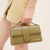 23E213BA007-3100-560_10-scaled-1.jpg Jacquemus Le grand Bambino Crossbody flap bag.