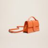 23E213BA007-3100-752_11.jpg Jacquemus Le grand Bambino Crossbody flap bag.