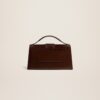 23E213BA007-3100-851_12.jpg Jacquemus Le grand Bambino Crossbody flap bag.
