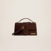 23E213BA007-3100-851_1_main.jpg Jacquemus Le grand Bambino Crossbody flap bag.