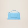 23E213BA007-3101-336_12.jpg Jacquemus Le grand Bambino Crossbody flap bag.