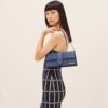 Jacquemus Le Bambino long  Long flap bag.