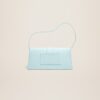 23E221BA013-3088-310_12.jpg Jacquemus Le Bambino long Long flap bag.