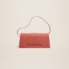 23E221BA013-3088-480_12.jpg Jacquemus Le Bambino long Long flap bag.
