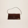 23E221BA013-3100-851_1_main.jpg Jacquemus Le Bambino long Long flap bag.