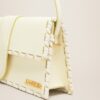 Jacquemus Le Bambino long lacet  Long laced flap bag.