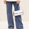 23E231BA049-3108-320_10-scaled-1.jpg Jacquemus Le Bambino long lacet Long laced flap bag.
