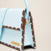 23E231BA049-3108-320_13.jpg Jacquemus Le Bambino long lacet Long laced flap bag.