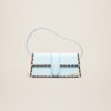23E231BA049-3108-320_1_main.jpg Jacquemus Le Bambino long lacet Long laced flap bag.