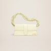 23E231BA051-3108-210_13.jpg Jacquemus Le Bambino long Ficiu Strand strap flap bag.