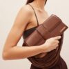 23E231BA051-3108-850_10-scaled-1.jpg Jacquemus Le Bambino long Ficiu Strand strap flap bag.